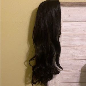 Black wig, long. Never worn